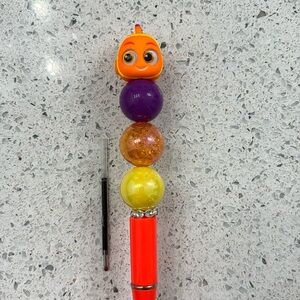 Neon Nemo Doorables Pen with ink refill